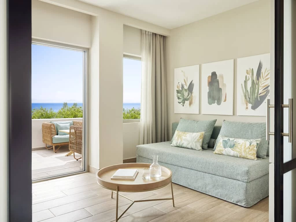 Image Chambre supérieure famille jardin privé vue mer