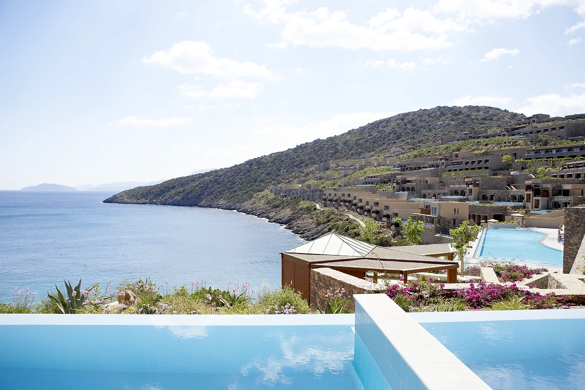 Image Chambre deluxe vue mer et piscine individuelle