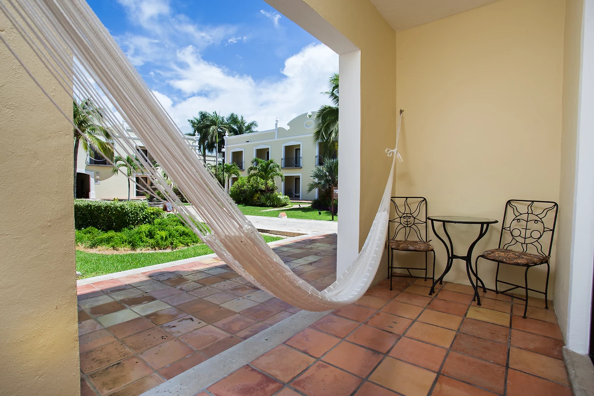 Image Chambre deluxe et suites vue jardin